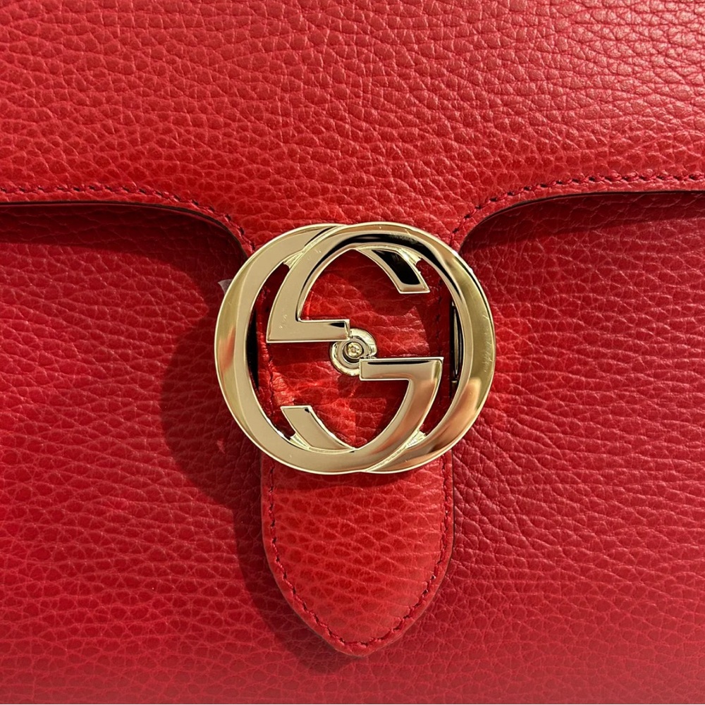 Authentic Gucci deep red leather Dollar interlocking GG medium handle bag.